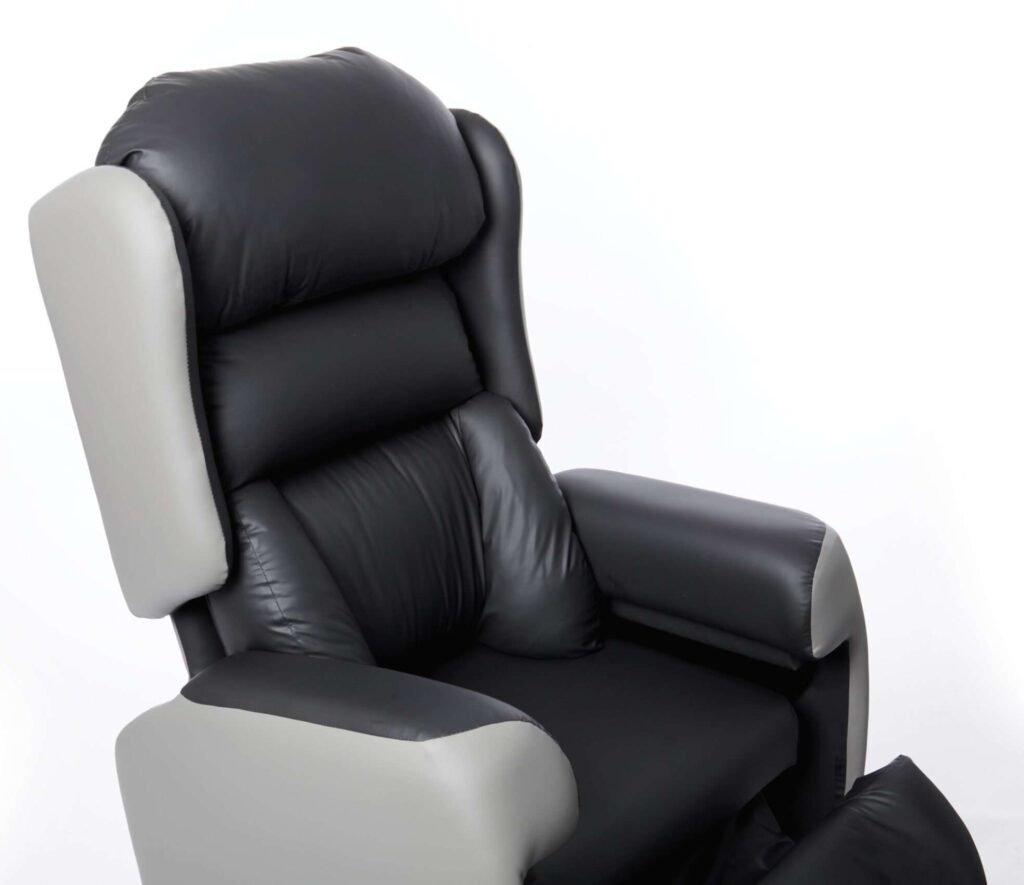 Waterfall lateral backrest in the Lento Care Chair with adjustable waterfall cushions to provide back support for lordosis in the lumbar region