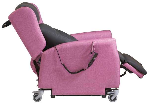 A riser recliner chair reclined back with the feet elevated and lateral supports stopping the person from slumping to one side or the other