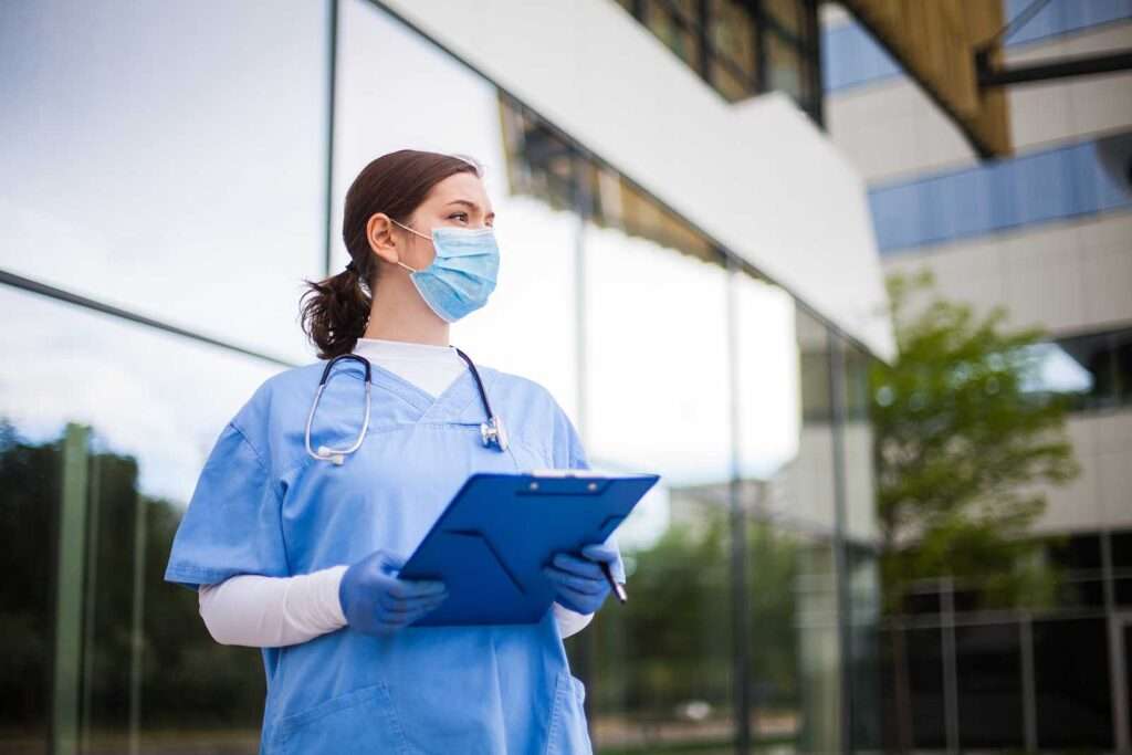 nurse outside hospital