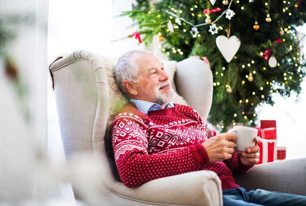 older man in armchair 